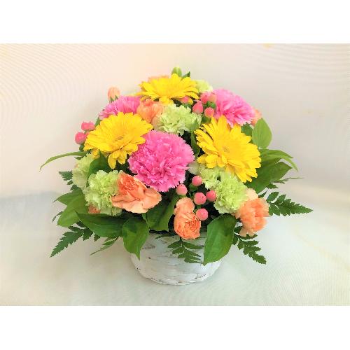 ピンクイエローの華やかなアレンジメント」| 花屋「ポピー」の